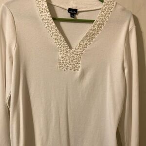 This is a beautiful lite  wear top in excellent condition